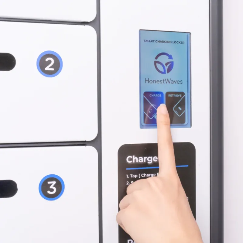 Finger pressing touchscreen of ClimateGuard 6 Outdoor Phone Charging Locker