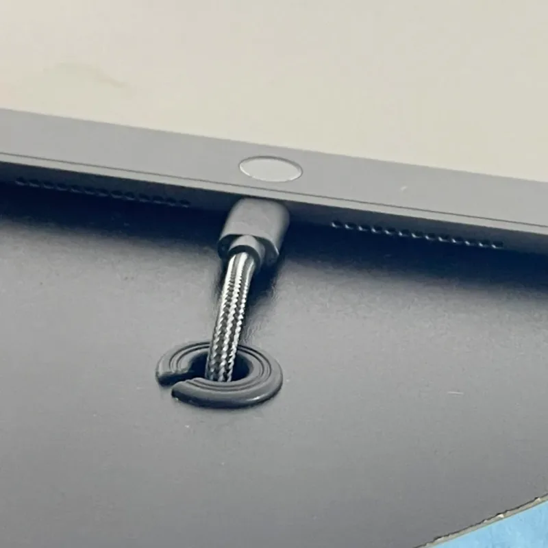 Close Up of the Retractable Cable on Pop-up Table 6 Pro