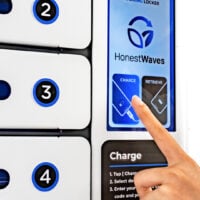 Finger On Touchscreen of the SecureCharge 8 Phone Charging Station