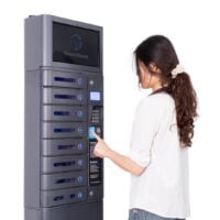 Brunette Woman Pressing Button on the SecureCharge 8 Pin Pro