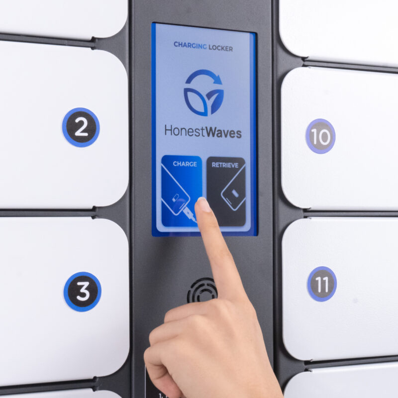 Finger Pressing Charge Button on the SecureTech 16 Device Charging Locker