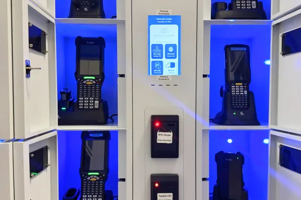 Multiple scanners being charged in locker bays